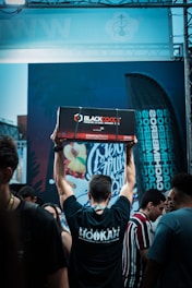 Photo of Borneo Digital Commodities warehouse with stacked coconut shell charcoal bags.