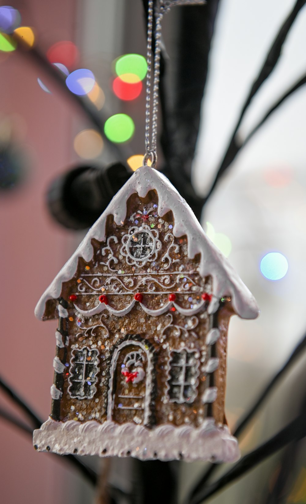 a christmas ornament hanging from a tree