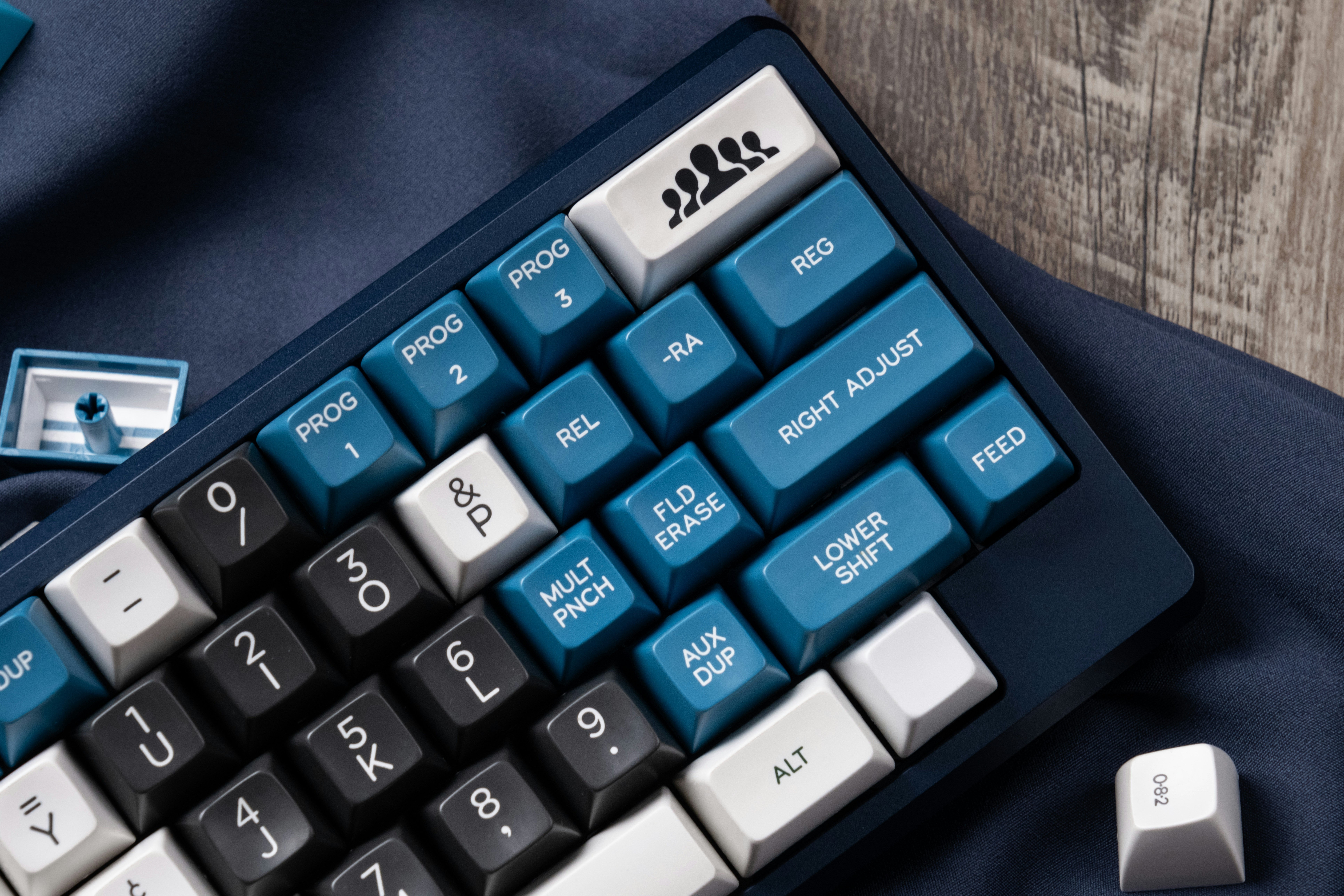 a computer keyboard sitting on top of a table