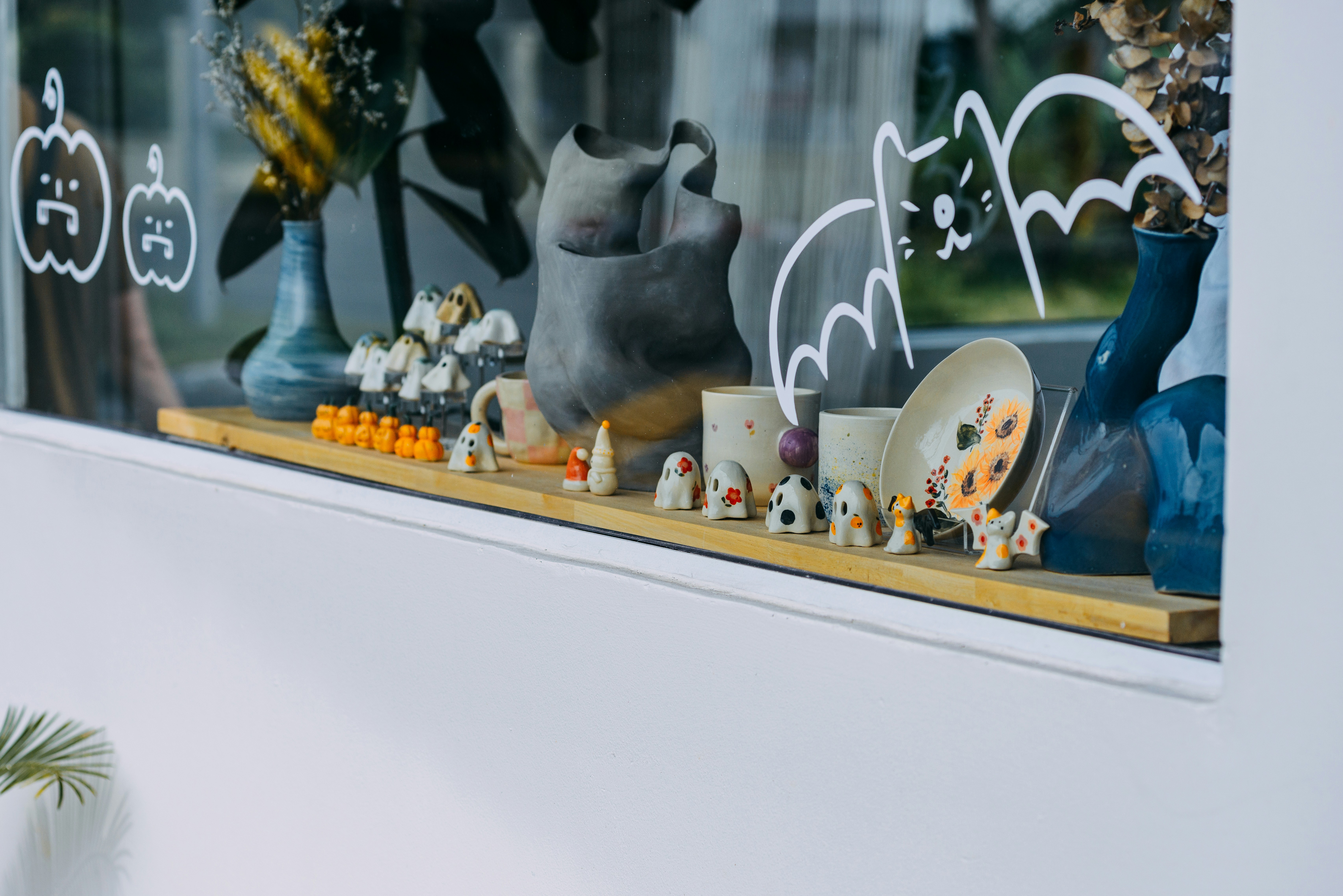 a window with a bunch of different items in it