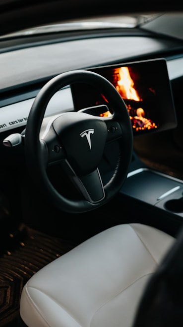 A close-up of a Tesla dashboard showcasing advanced technology.