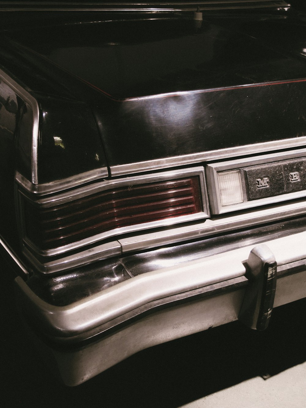 a close up of a car parked in a parking lot