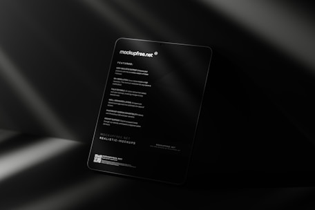 a black business card sitting on top of a table