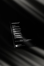 a close up of a cell phone with a blurry background