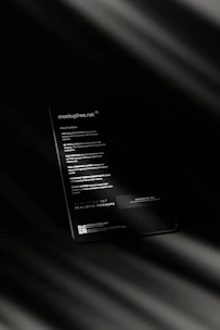 a close up of a cell phone with a blurry background