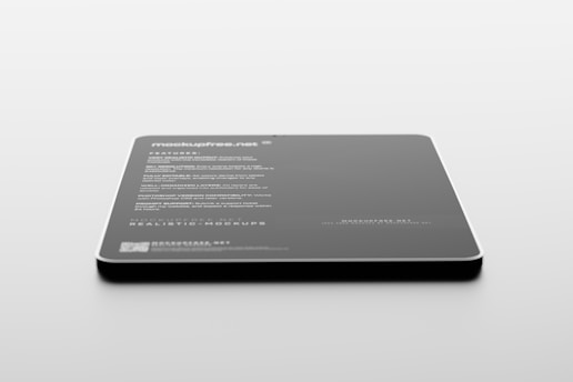 A sleek, rectangular black object with rounded corners rests on a light surface. Text in white is visible on its surface, listing features and specifications, suggesting it is a product mockup or digital screen template.