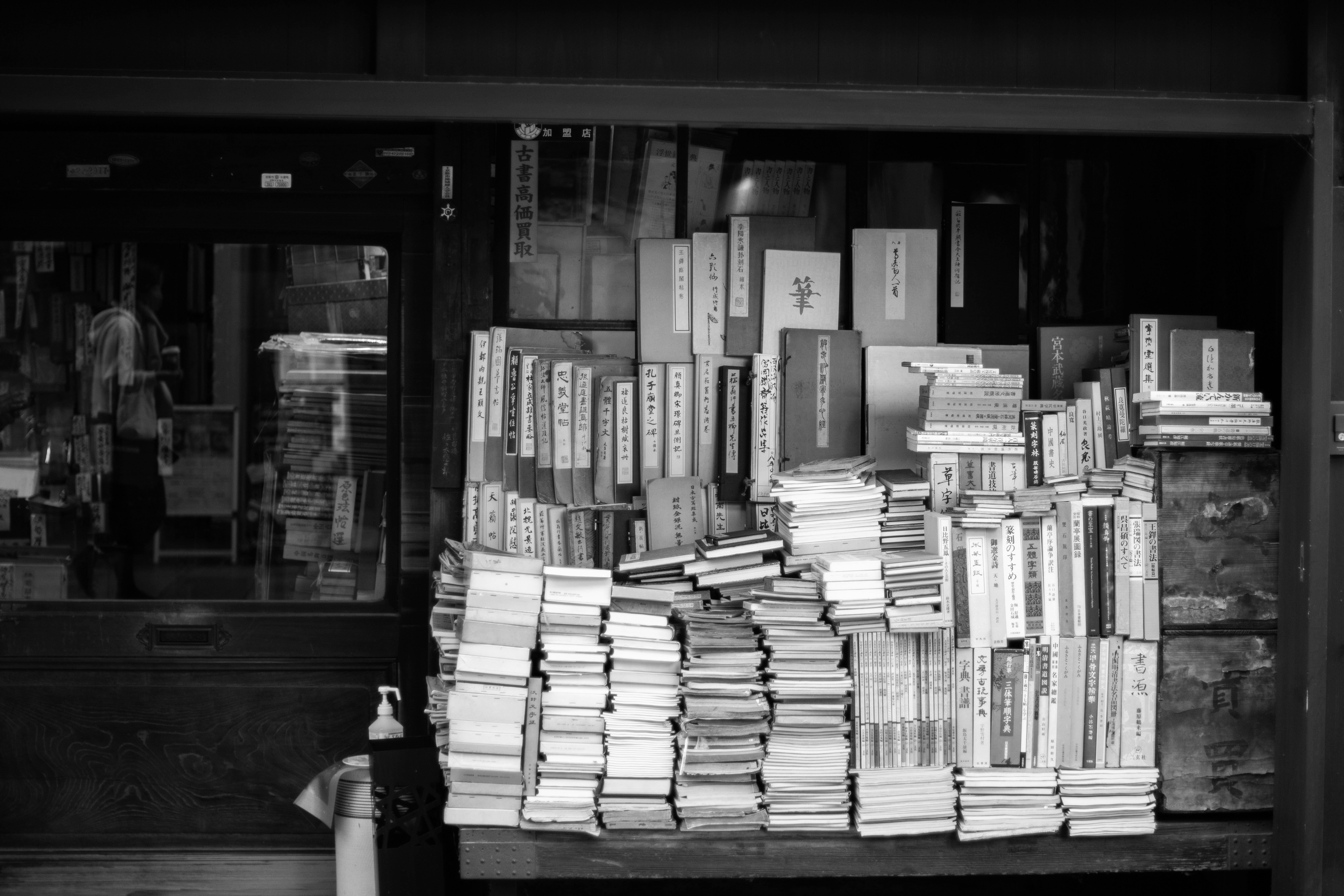 a pile of books sitting on top of a table