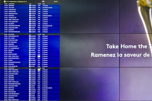 Close-up of a laptop screen showing multiple flight options and schedules.