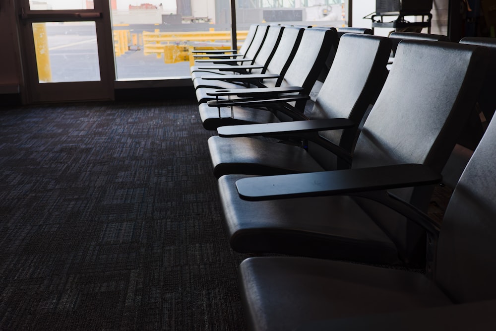 a row of empty seats in a waiting area
