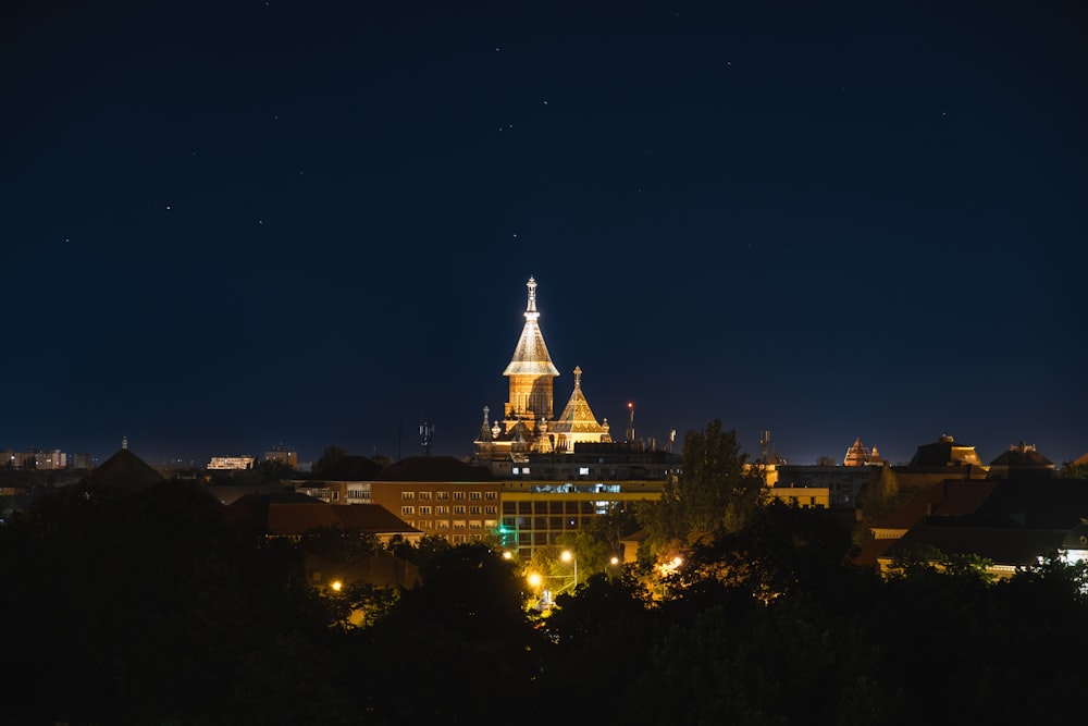 a view of a city at night from a distance