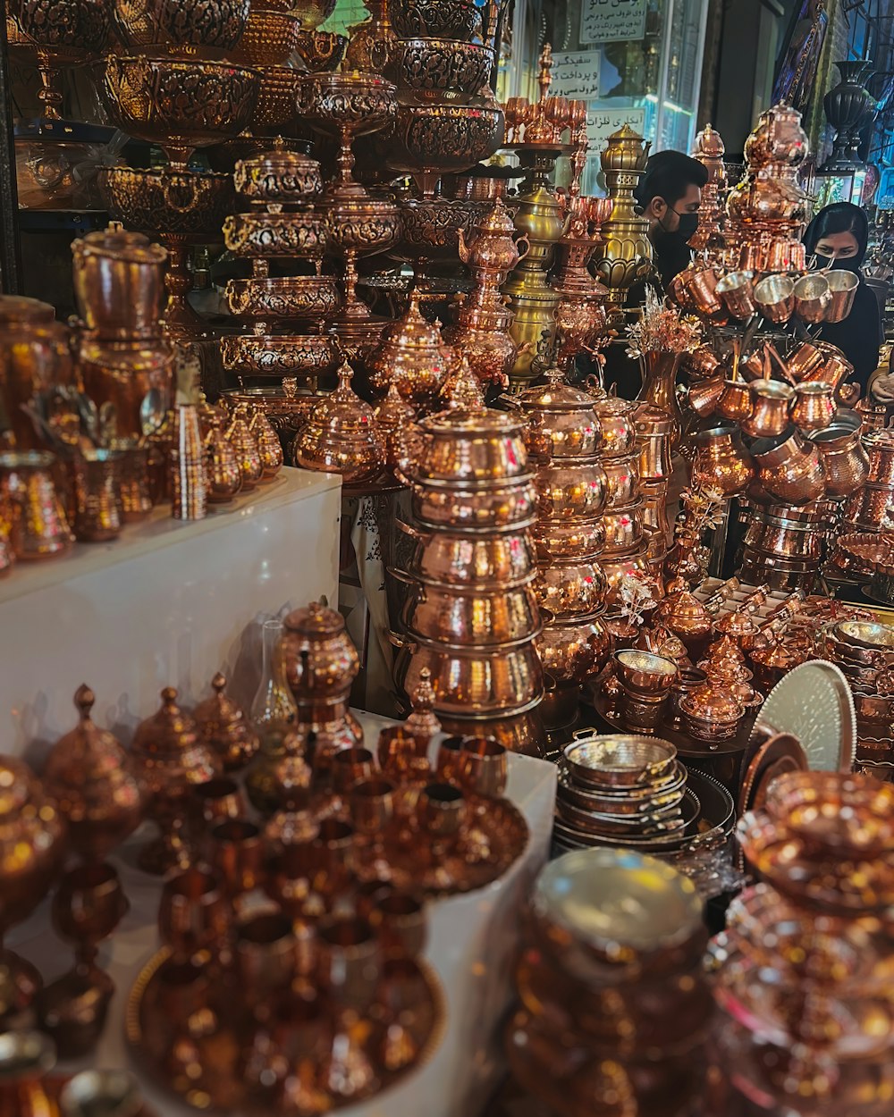 a large amount of copper pots and pans