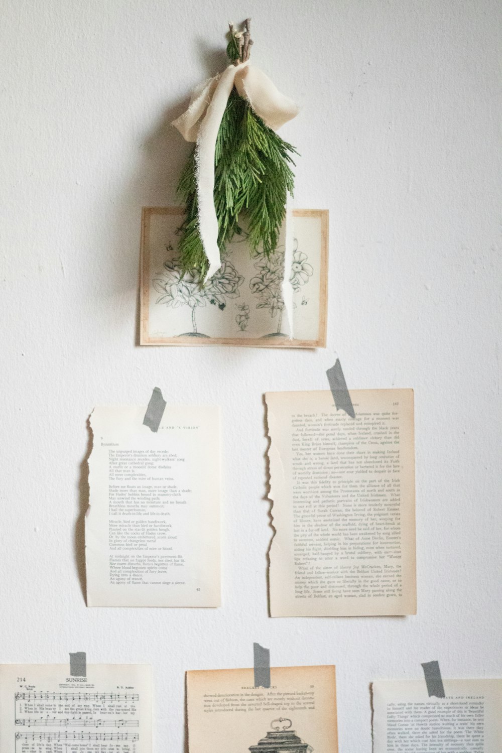 a bunch of old books hanging on a wall