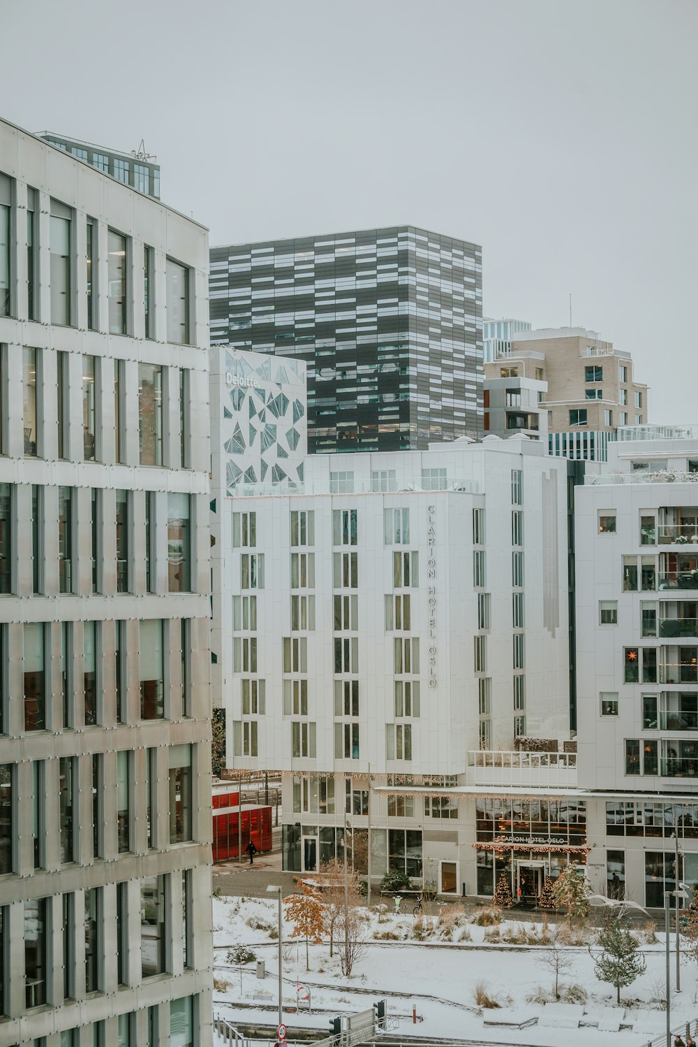 a view of a city with tall buildings in the background