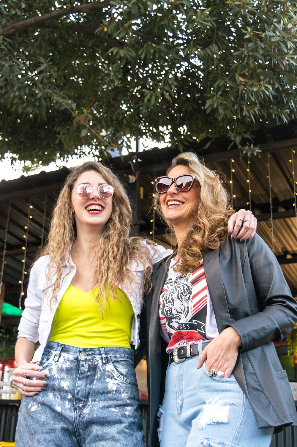 a couple of women standing next to each other