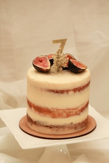 a cake with a number one on top of it