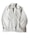 A light beige or off-white jacket with a zipper closure and a collar. The jacket has long sleeves with elastic cuffs and side pockets. The fabric appears to be smooth and slightly shiny. A label is visible on the inside near the collar.