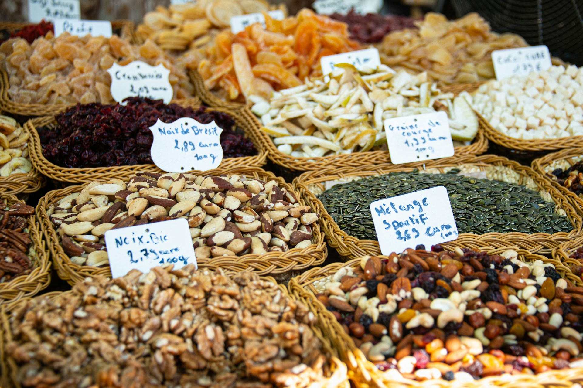 a variety of nuts and dried fruits for sale