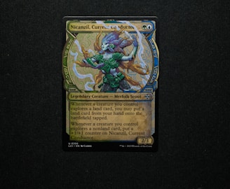 A colorful trading card featuring an illustrated character with aquatic features and vibrant armor. The card includes text boxes with game information and stats, and is set against a dark background.