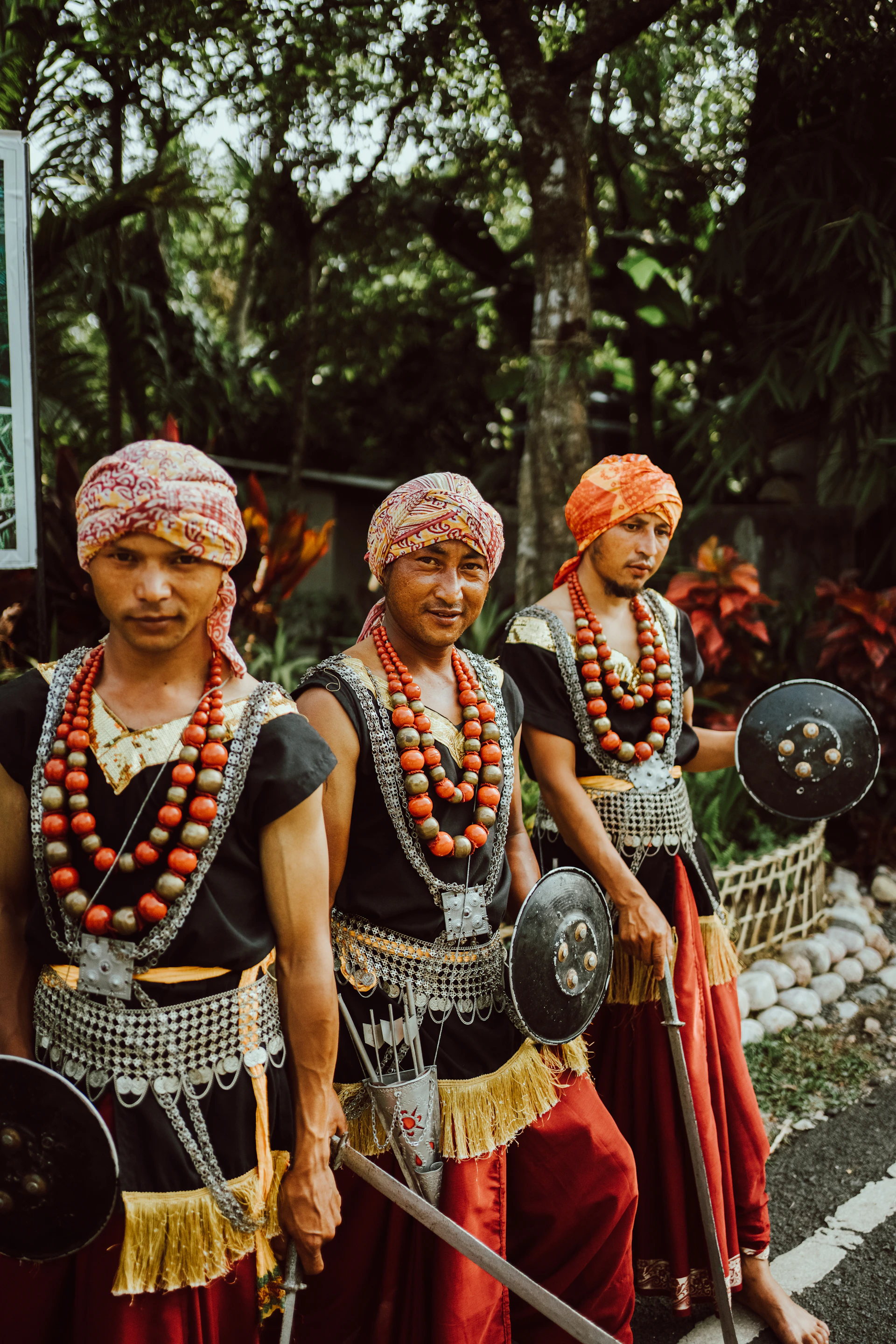 a group of men in costume standing next to each other