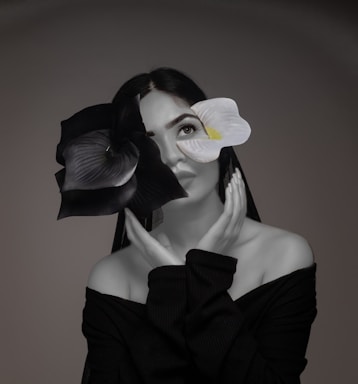 Black and white portrait of Guadalupe Carlota in a minimalist grayscale style.