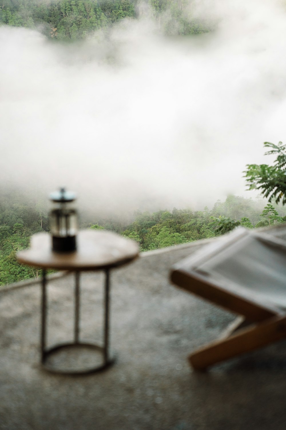 a table with a coffee cup sitting on top of it