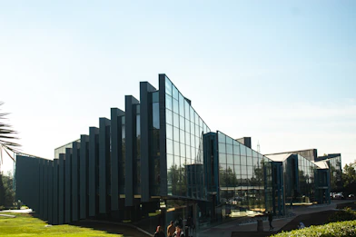 a group of people standing outside of a building
