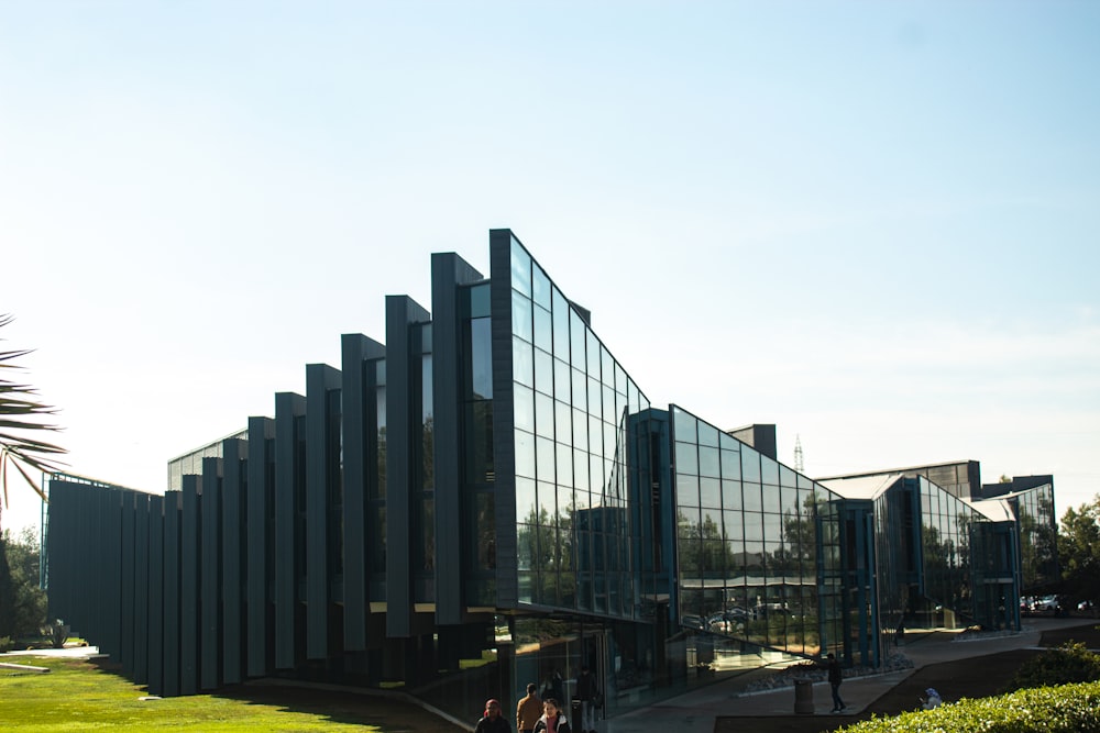 a group of people standing outside of a building