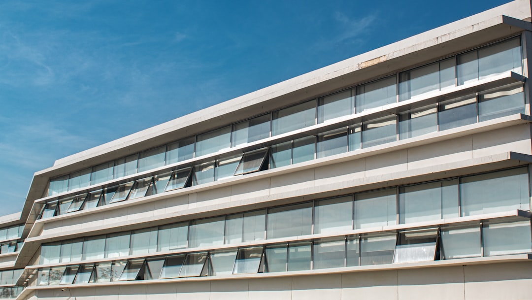 a tall building with lots of windows on top of it, Structural photography