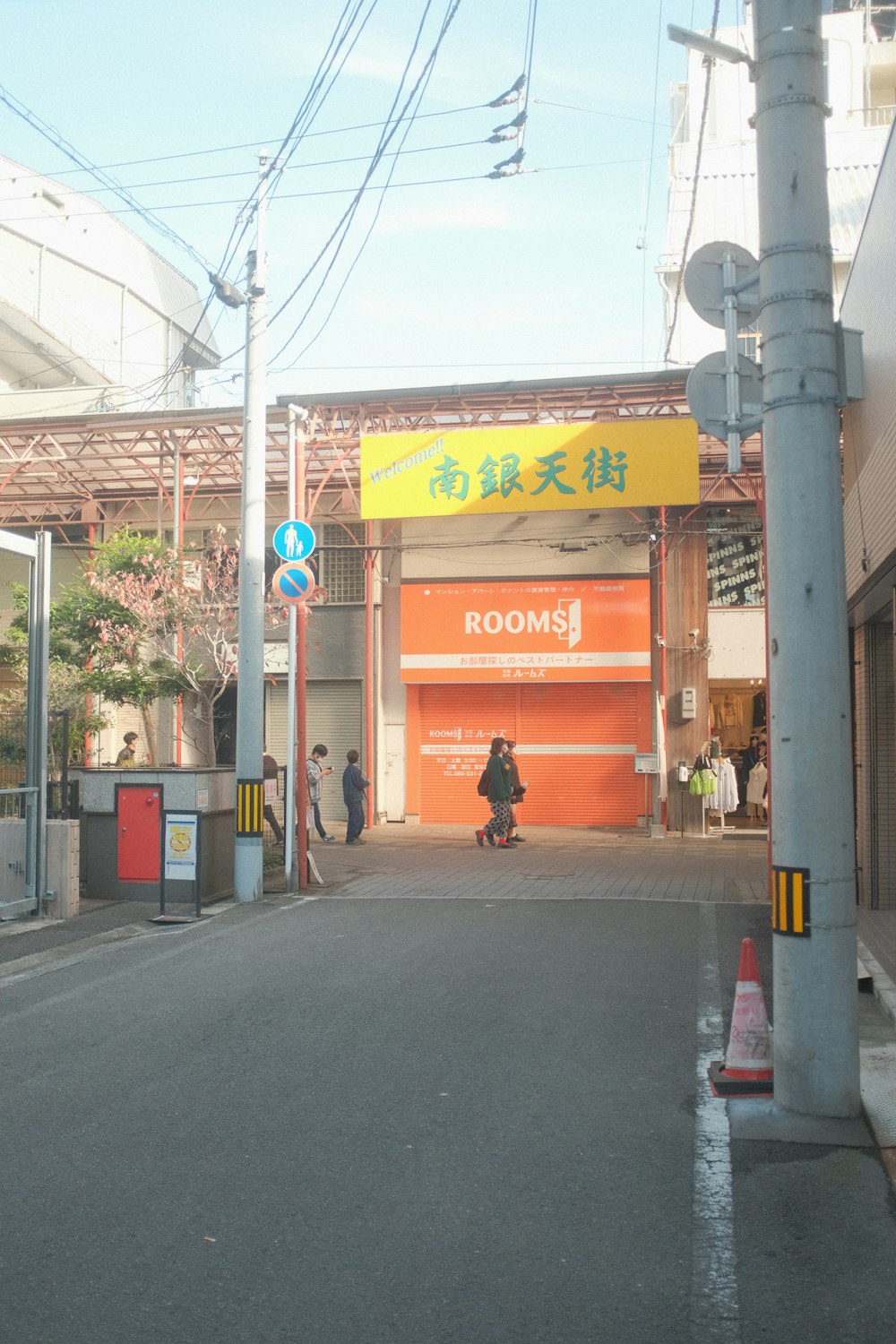 a person riding a skateboard down a street