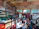 Cozy Scandinavian-style cafe interior bustling with customers enjoying seasonal dishes.
