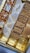 A vibrant display of assorted traditional sweets arranged on a decorative platter, showcasing their rich colors and textures.