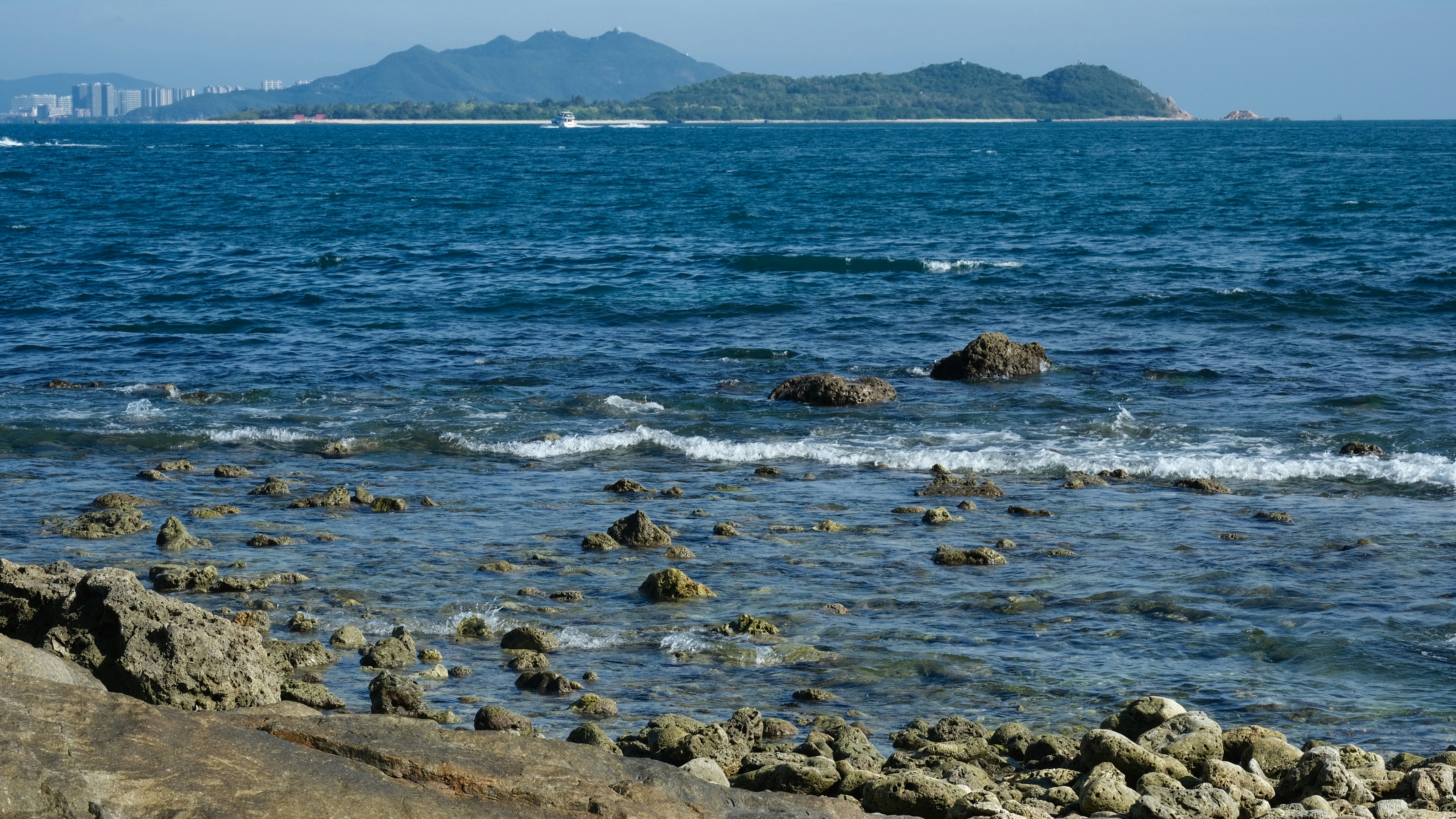 a large body of water surrounded by rocks