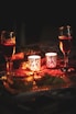 A cozy setting featuring candles lit in a warm, inviting atmosphere.