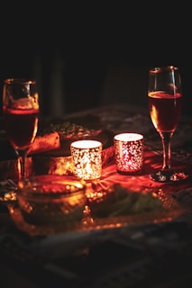 A romantic setting with candles and soft lighting, perfect for intimate moments.