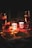 A warm, inviting candlelit room showcasing glowsn candles.