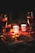 A warm, inviting candlelit room showcasing glowsn candles.