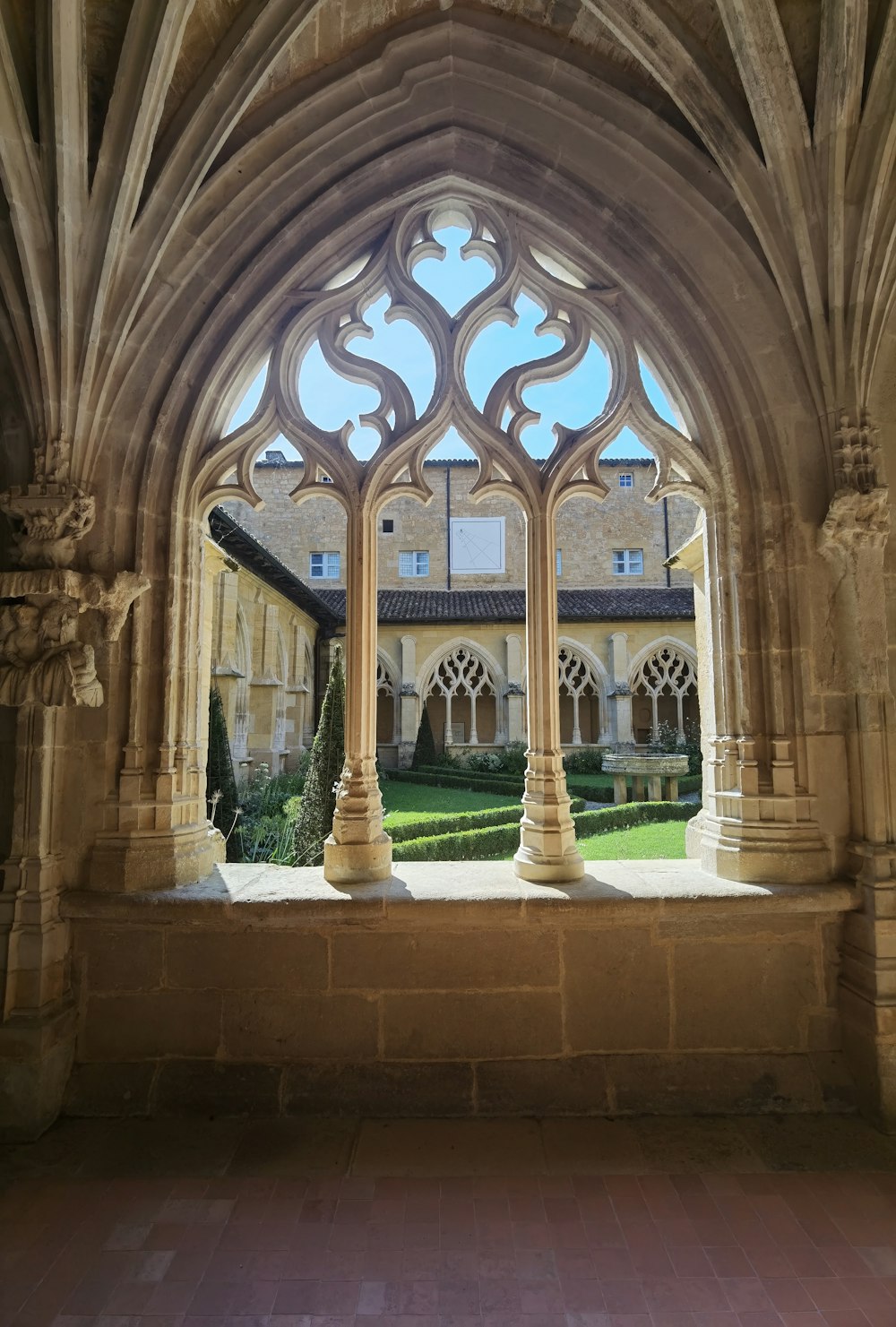 a view of a building through an archway