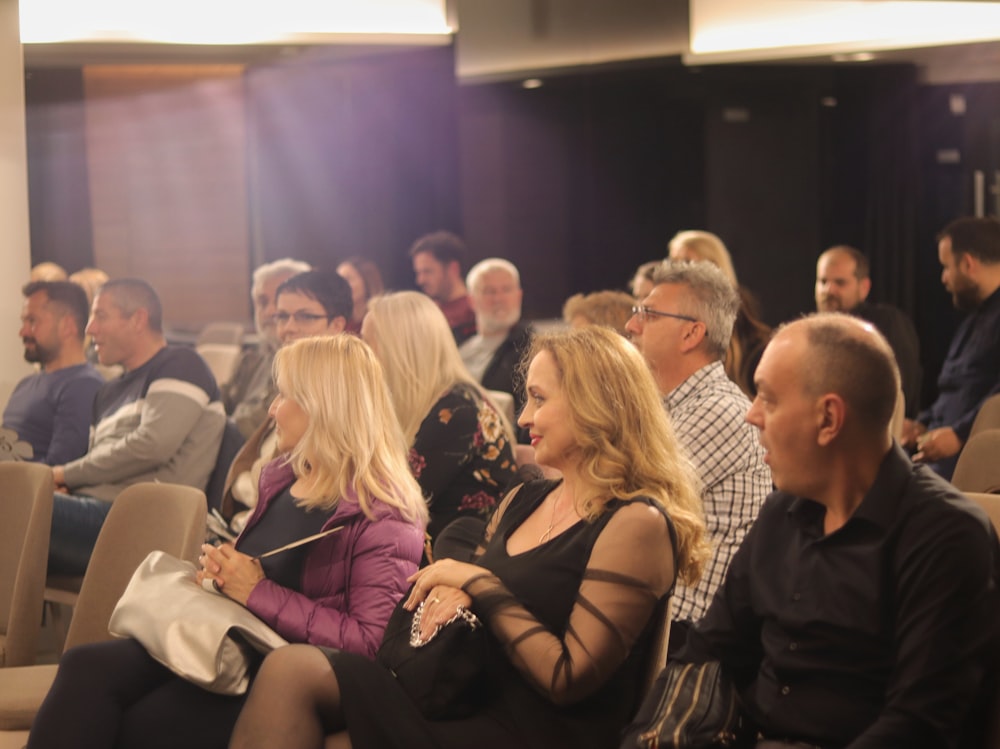 a group of people sitting in a room