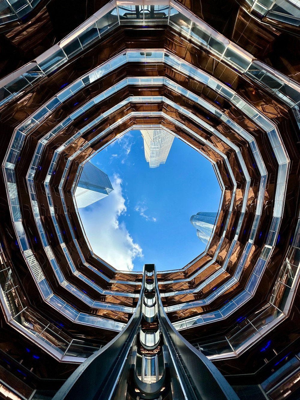 a view of the inside of a building looking up at the sky