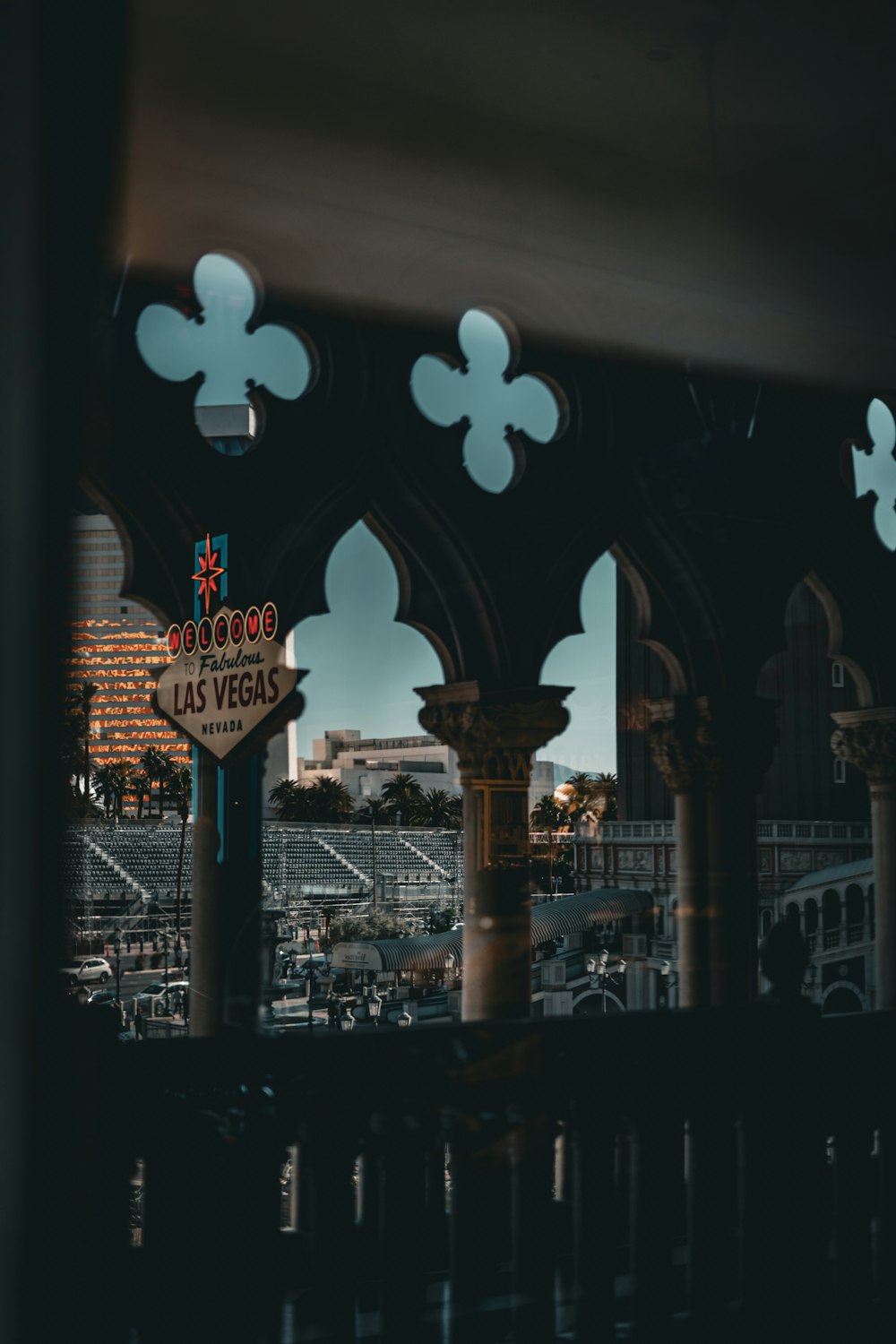 a view of the las vegas sign through a window