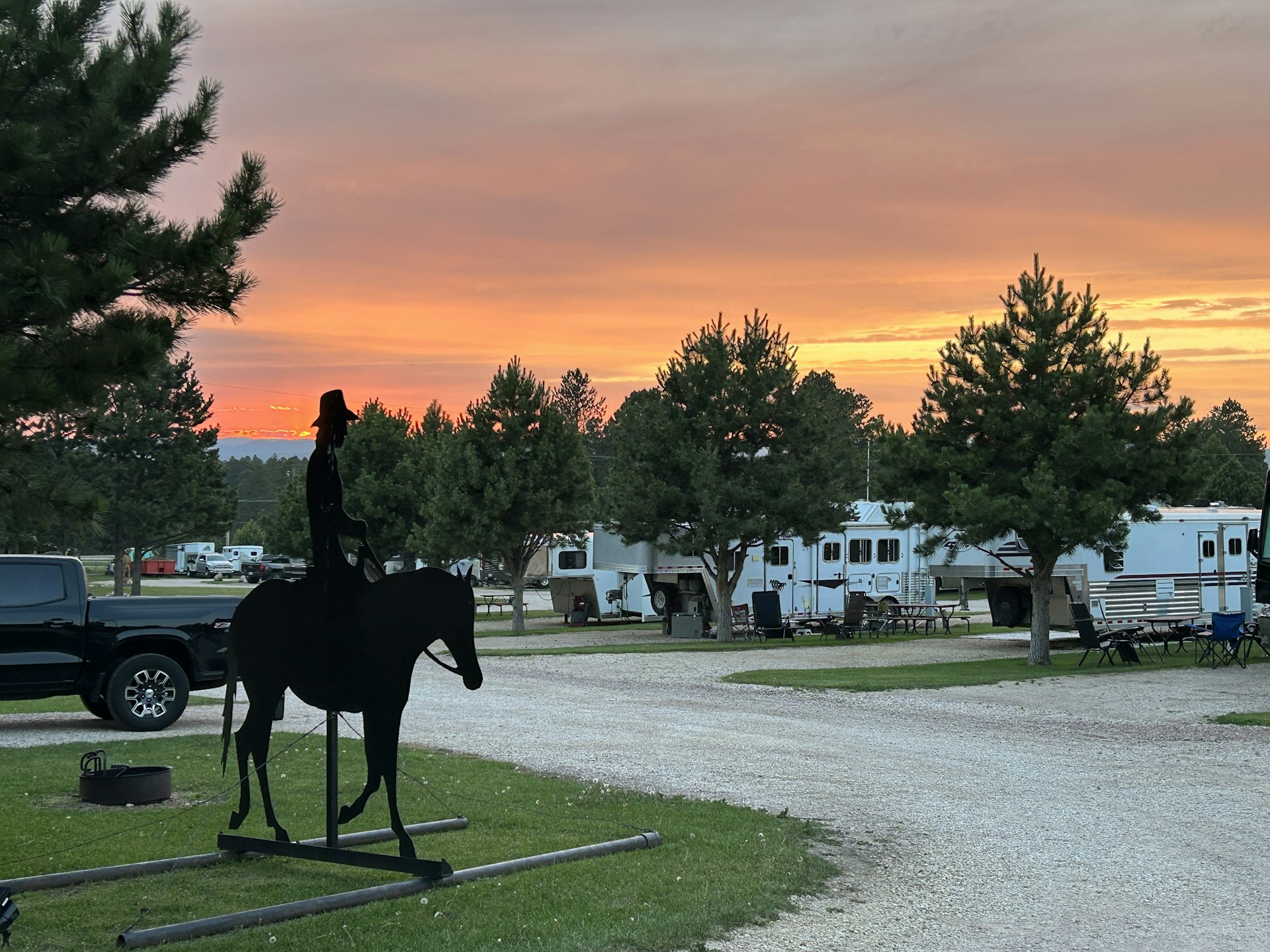 woman wearing yellow long-sleeved dress under white clouds and blue sky during daytime