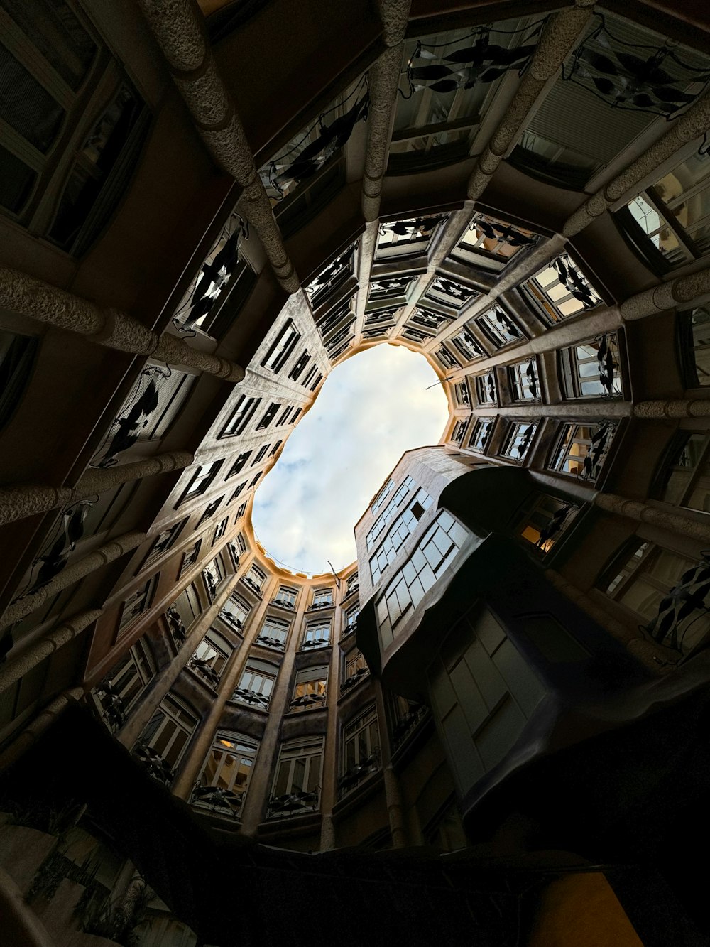 a very tall building with a skylight in the middle of it