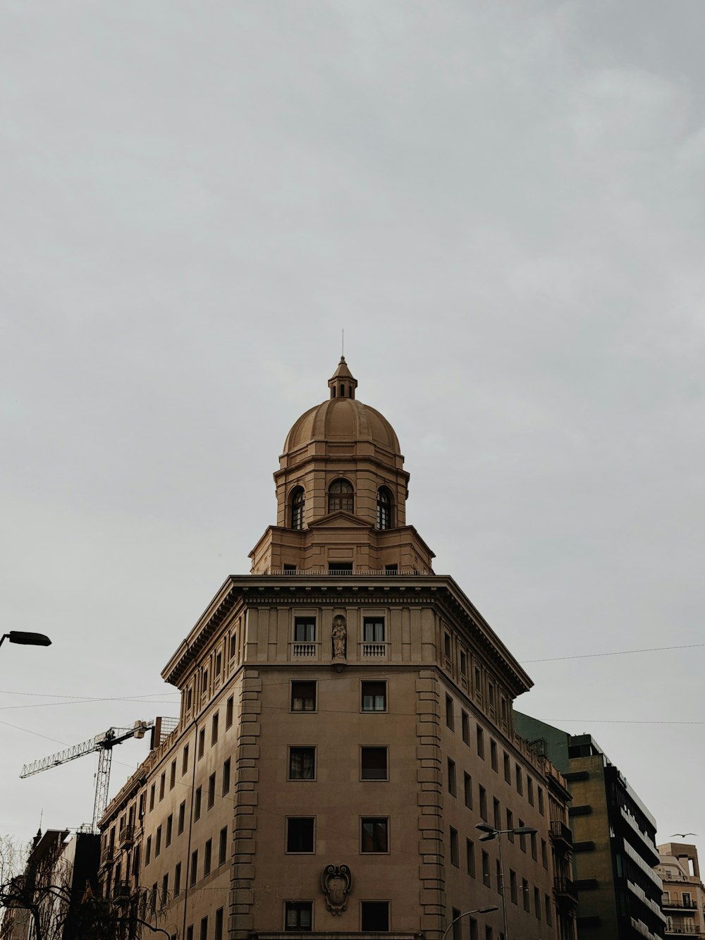 a tall building with a clock on the top of it