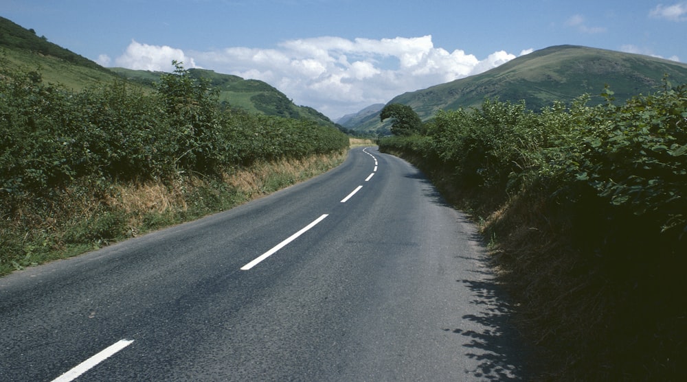 a road with a curve in the middle of it