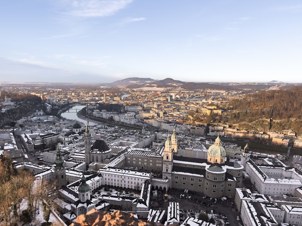 an aerial view of a city with a river running through it