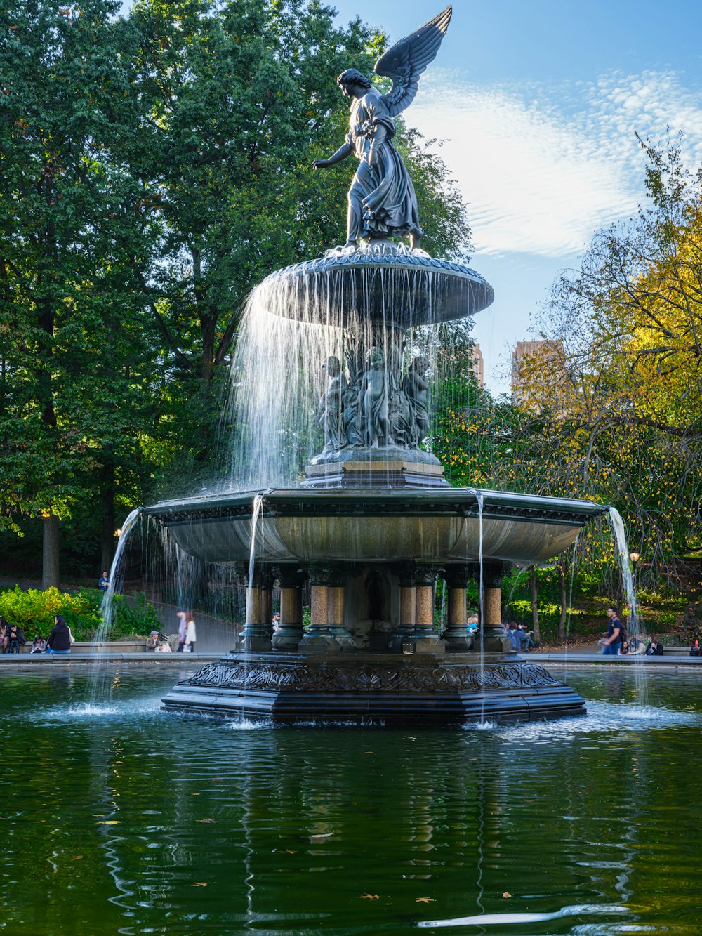 a fountain with a statue on top of it