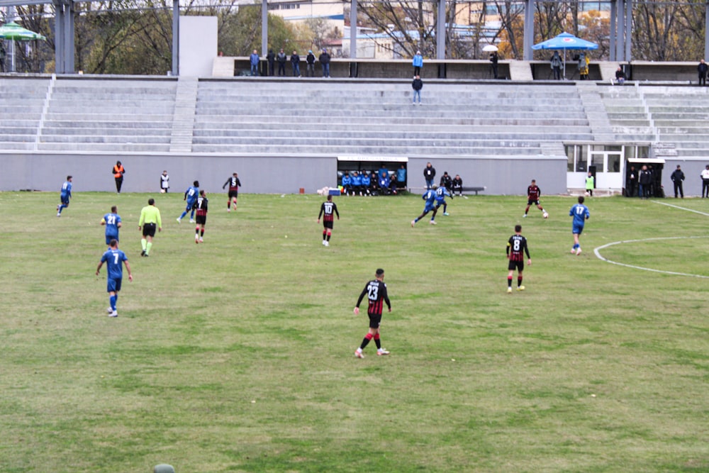 a group of young men playing a game of soccer