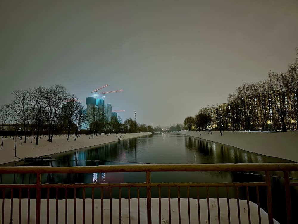 a view of a river and a city at night