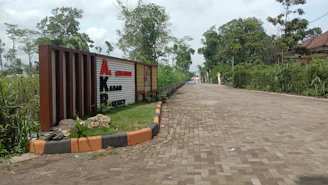 The pepperfields site entrance featuring clear signage and a glimpse of the structured yard layout.