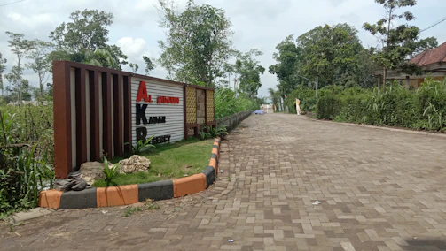 The pepperfields site entrance featuring clear signage and a glimpse of the structured yard layout.